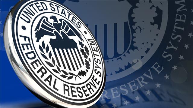 Fed leaves key interest rate unchanged, noting jobs slowdown