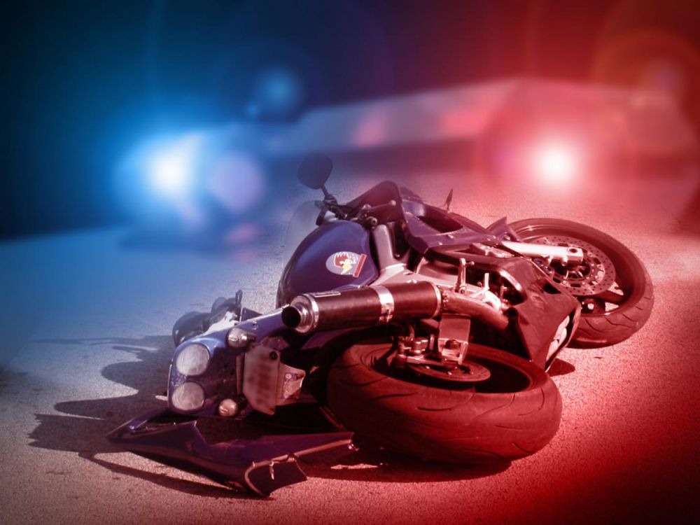 Car crash on Siegen Lane kills motorcyclist