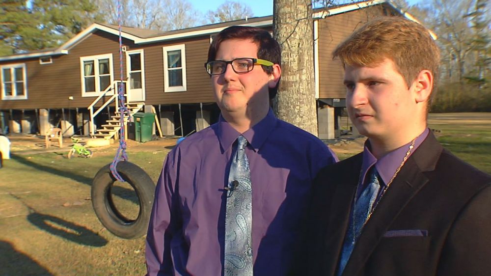 School leaders have change of heart after gay couple banned from prom