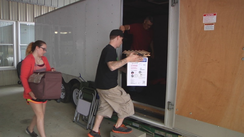 Low-lying areas packing up before possible flooding