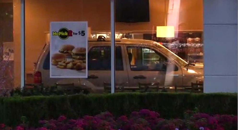 SUV plows through McDonald's lobby