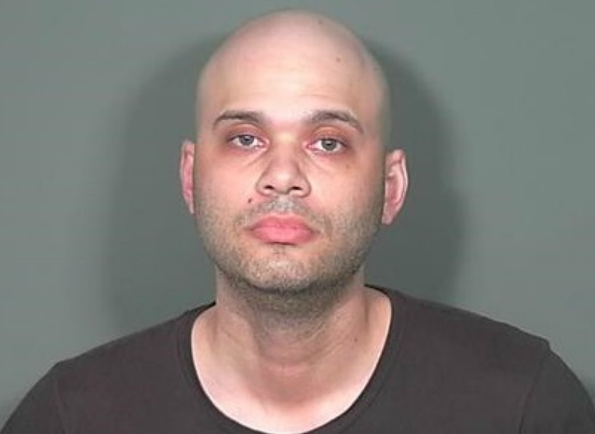 Man wanted after human and animal remains found on an altar at his home