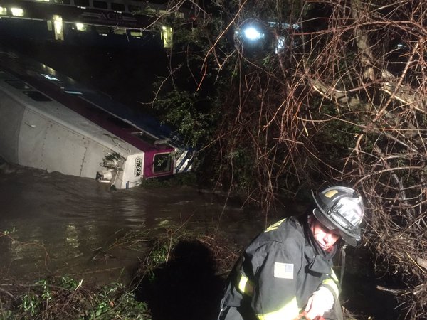 Commuter train derails, at least 14 hurt