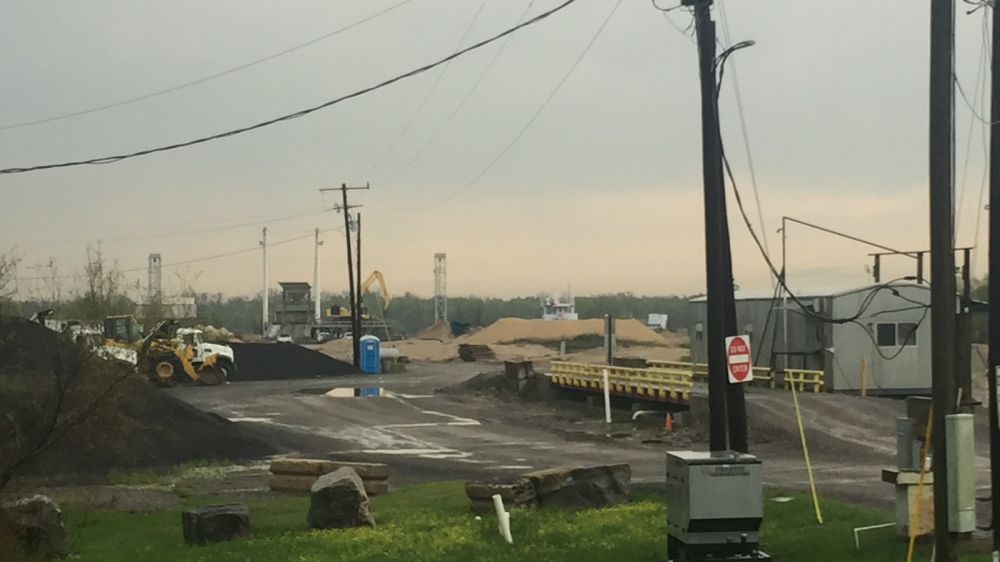 Worker died after being crushed by barge on river dock Friday