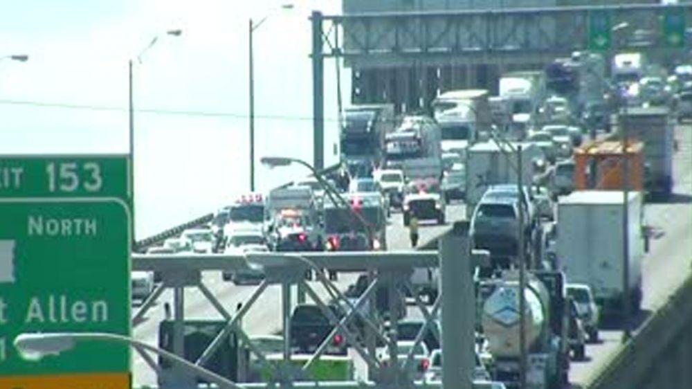 Stalled vehicle causes I-10 East delays on bridge
