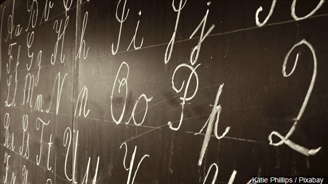 Edwards signs cursive writing mandate for schools into law