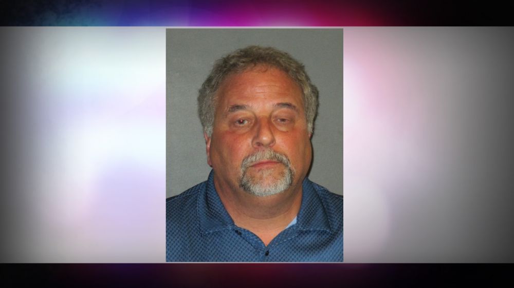 Man accused of pointing gun at another driver, fleeing accident