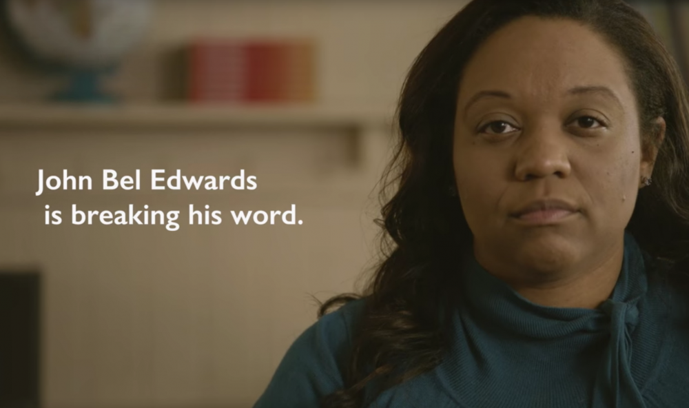 Pro-voucher group hits governor for cut proposal in TV ad