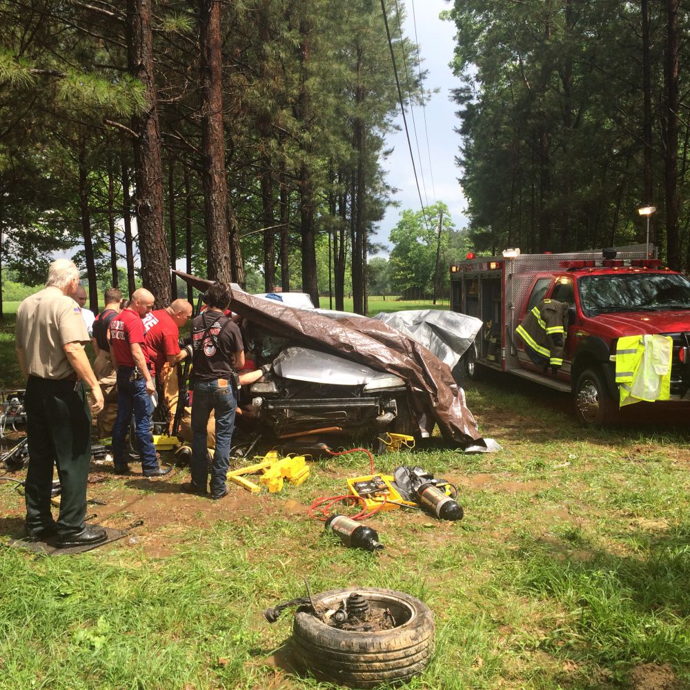 Passenger transported to hospital after trapped for more than two hours