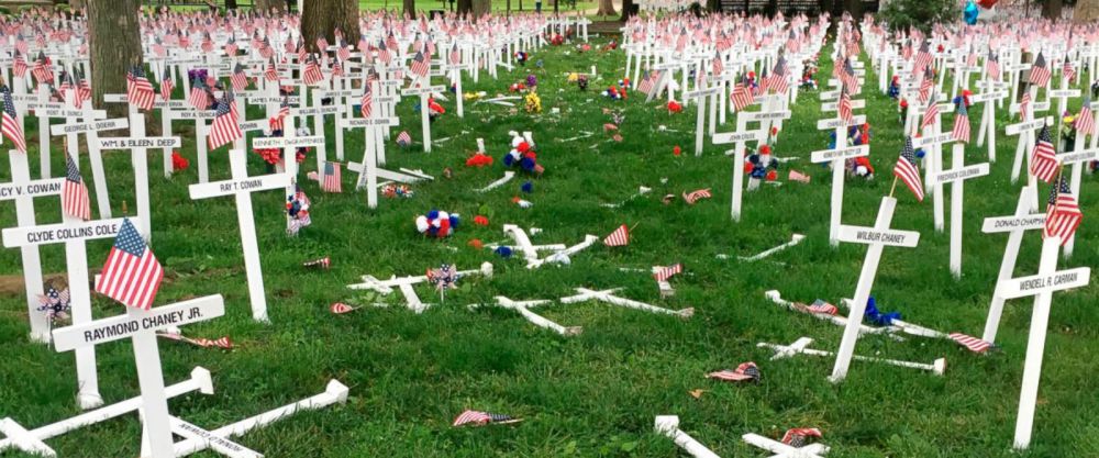 Police: Man drives through Kentucky memorial cross display