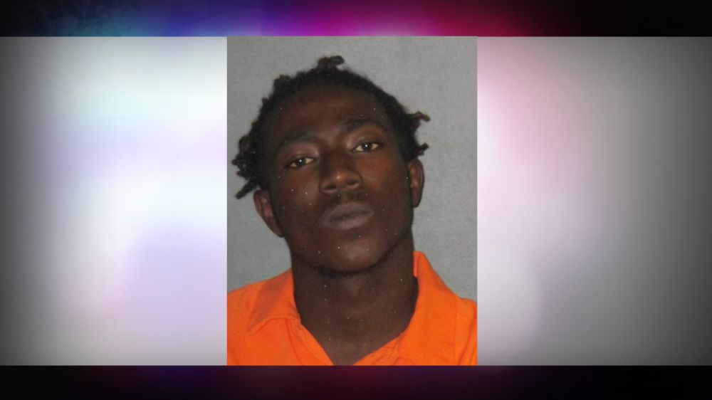 Man accused of opening fire on home with people inside