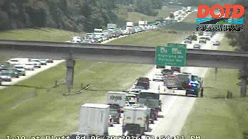 Car on fire causes I-10 West delays near Highland Rd. exit