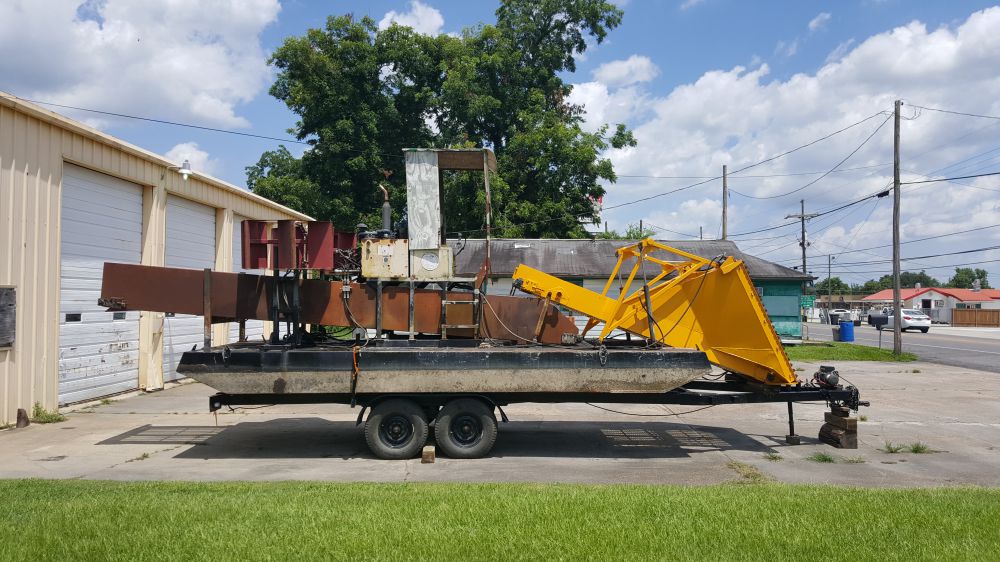 LSU using heavy machinery to remove plants from Crest Lake
