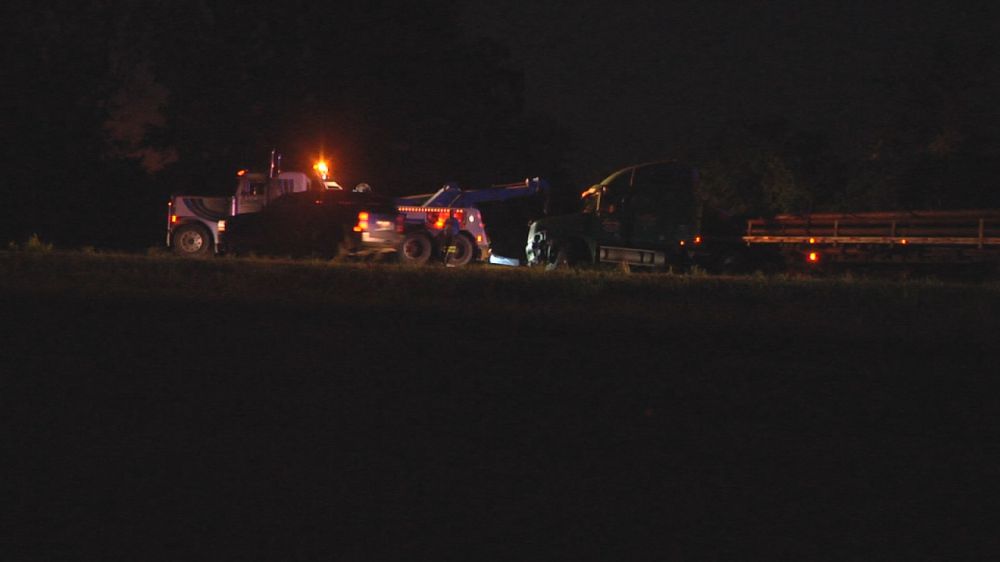 Bus passengers uninjured, truck driver transported after crash on I-10