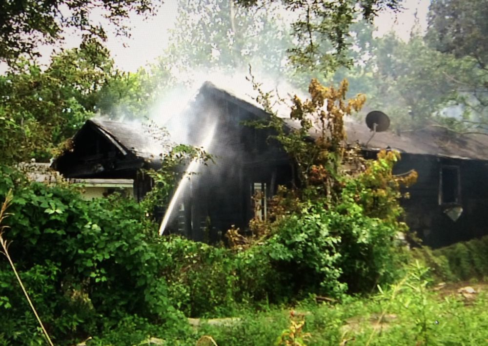 Firefighters say arson caused Topeka Street fire