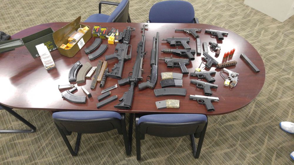 Man, 13-year-old arrested for possession of stolen guns
