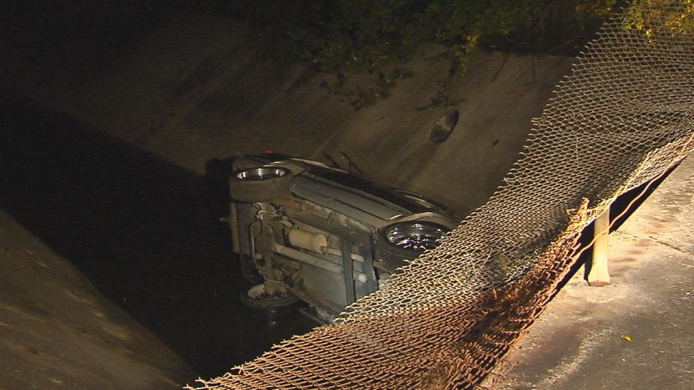 Car drives off bridge into canal on Greenwell Street
