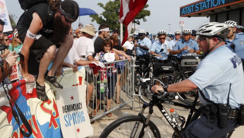 Protesters detained at the barricades outside of DNC