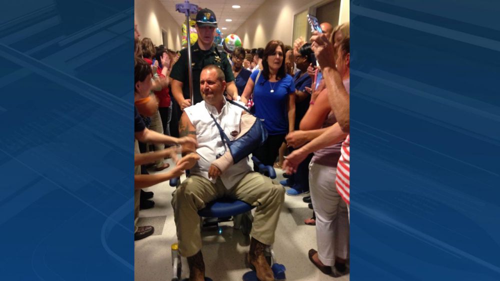 Injured deputy's tattoo of cross maintains shape after surgery