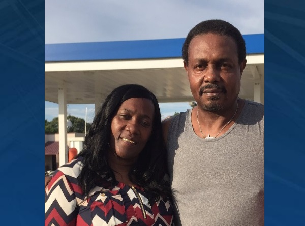 Alton Sterling's aunt, slain officer's dad embrace, pray at memorial