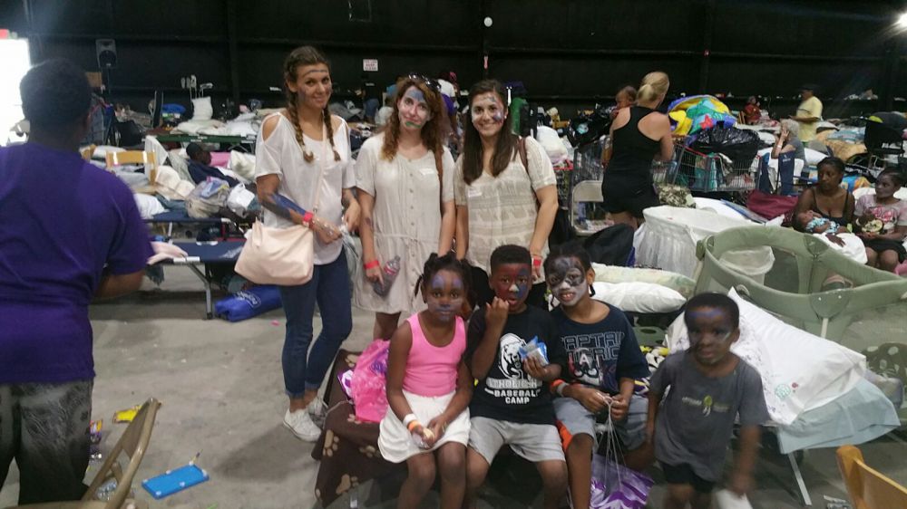 Volunteers keep children happy with free face painting