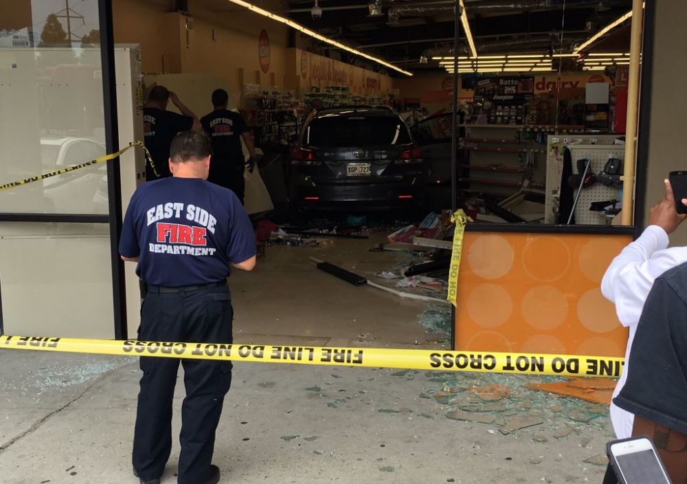 Two hurt when car crashed through store Wednesday