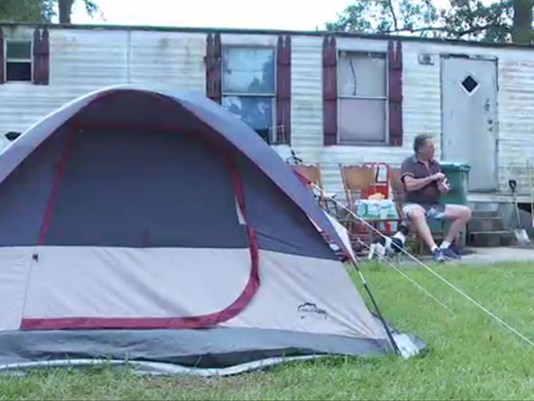 Families living in tents or moldy homes wait for FEMA housing