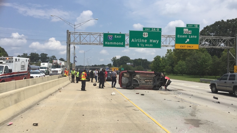 No injuries after car overturns on I-12 east