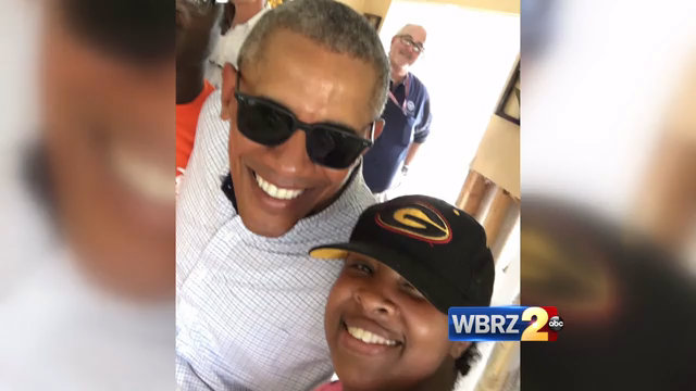 President tours flood ravaged areas, snaps selfies with flood victims