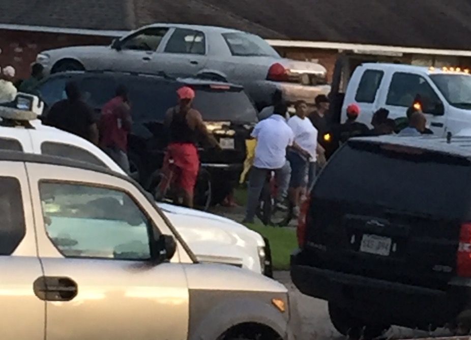 Neighbors say woman died after car swept away by high water