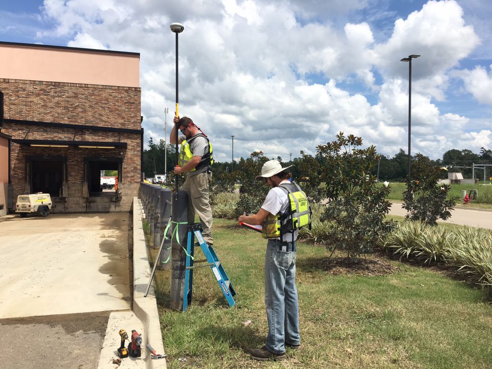 USGS measuring water marks from catastrophic flooding
