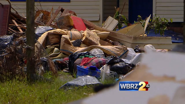 Clinton residents begin gutting homes following flood