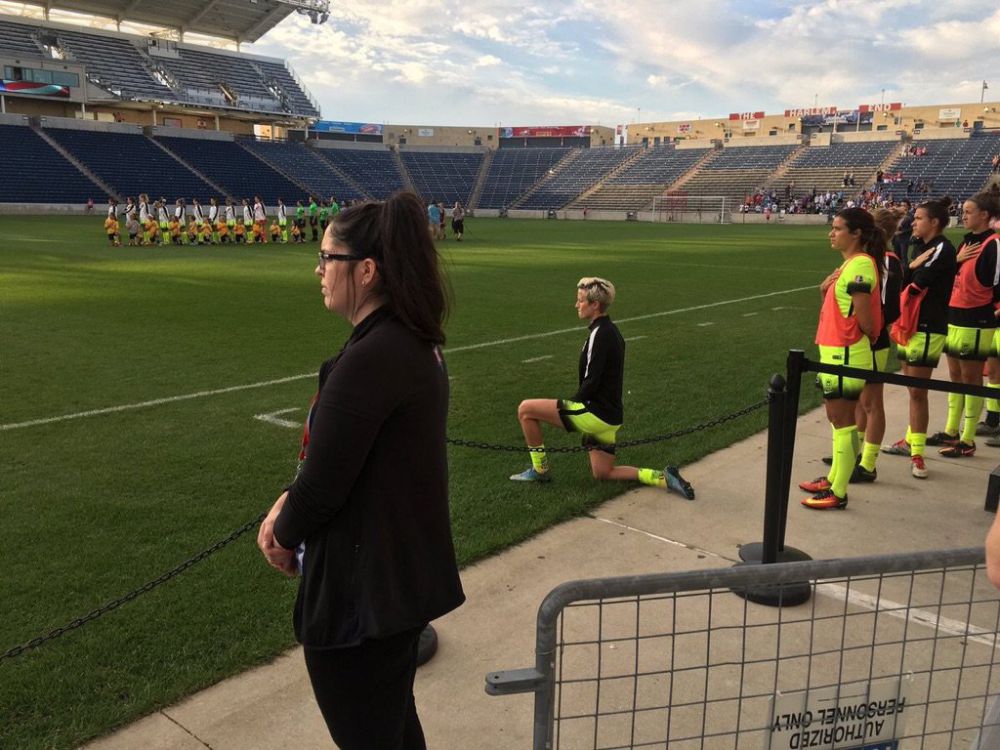 U.S. Soccer star Megan Rapinoe kneels during national anthem
