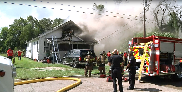 Authorities respond to house fire on S. 11th Street