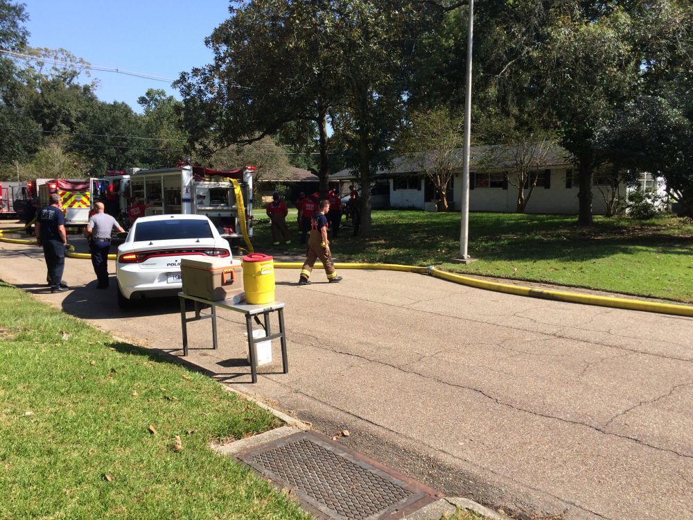 Woman transported from house fire on Mollylea Drive