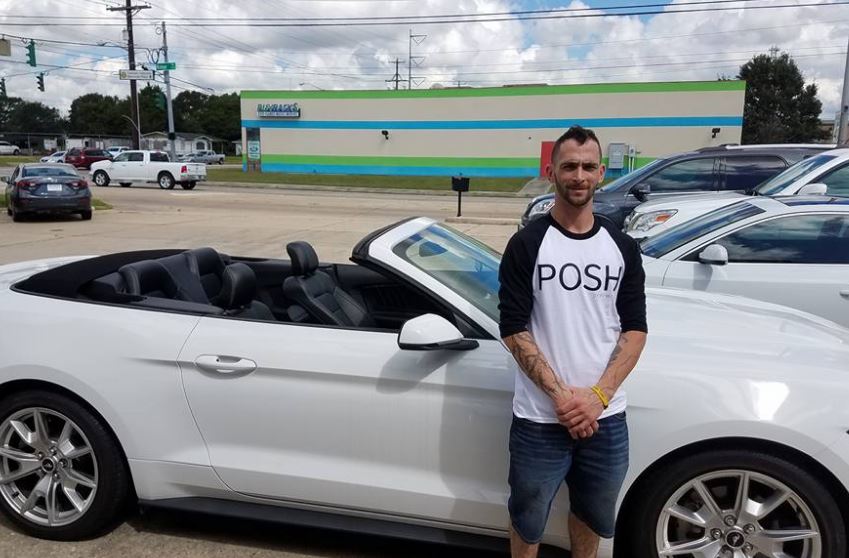 Escaped inmate steals car from Lafayette dealership