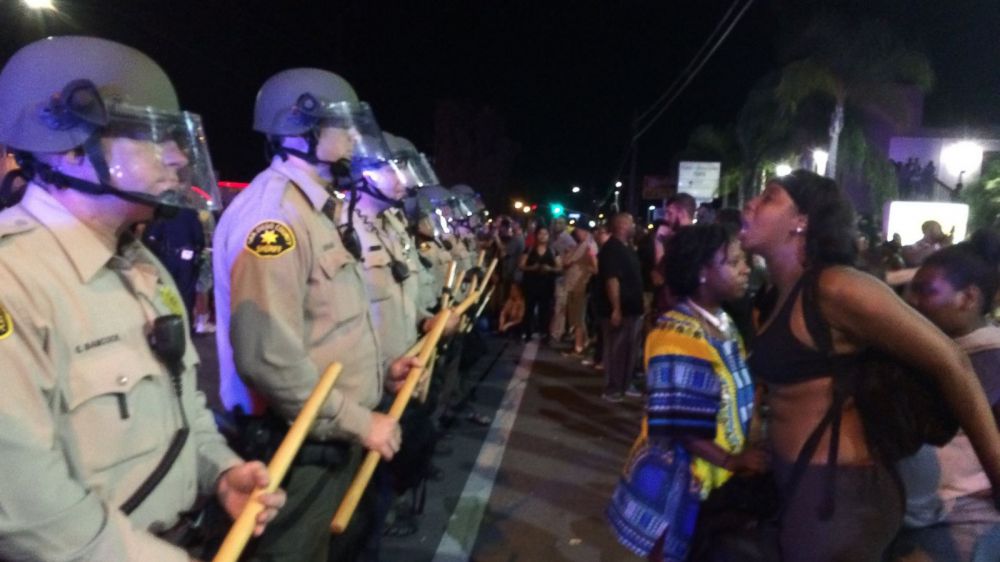 Some scrapes with police in California protests; two arrested