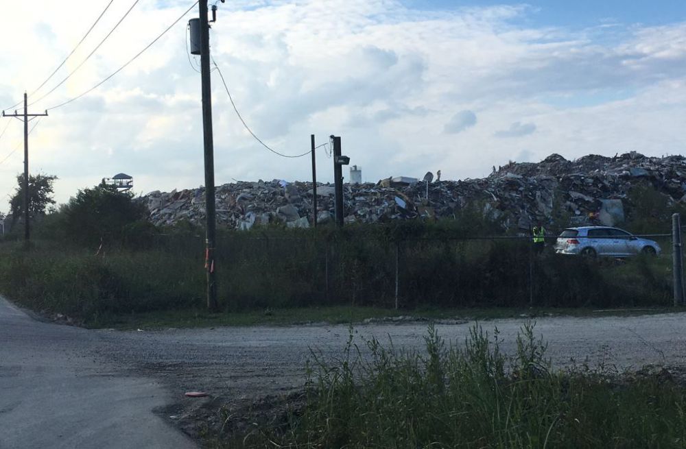 Debris worker rescued after getting stranded on lift equipment