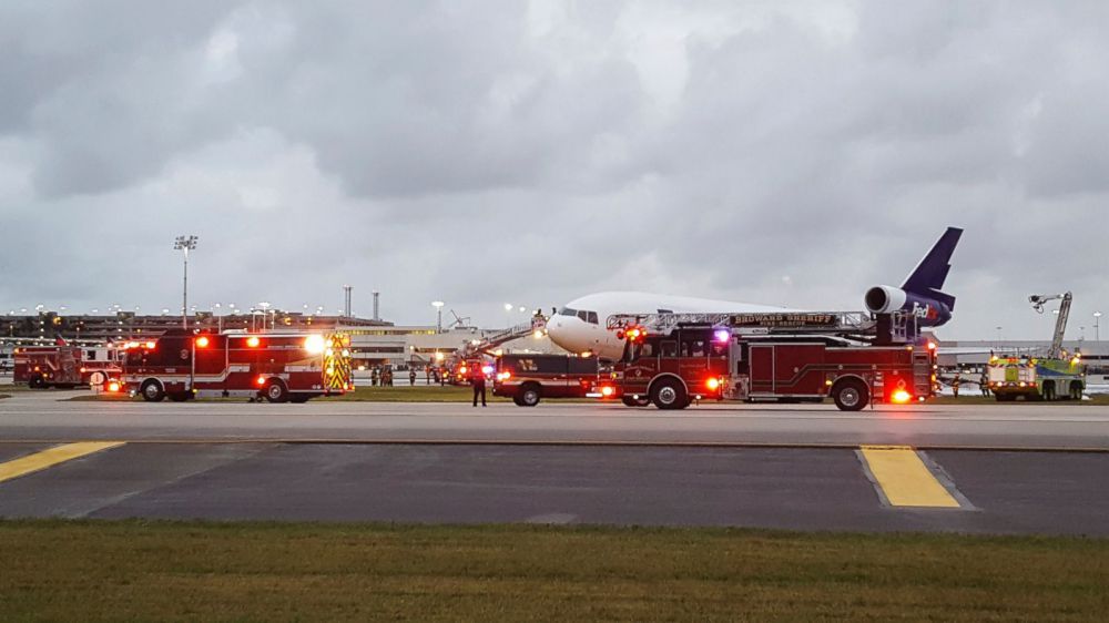 Investigators assess FedEx plane after Florida airport fire