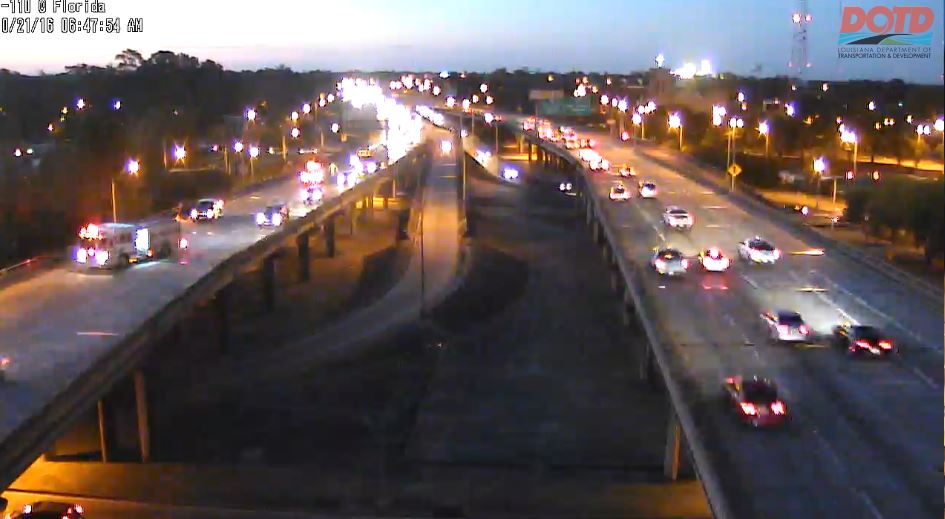 Car on fire closes lanes on I-110 NB