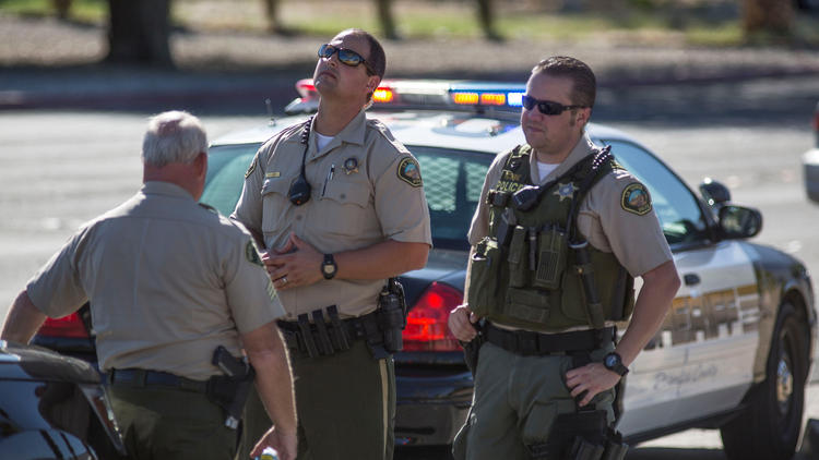 Murder charges pending in police officer deaths