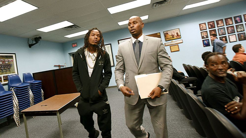 Rapper Fetty Wap brings $165K to court, pays $360 fine