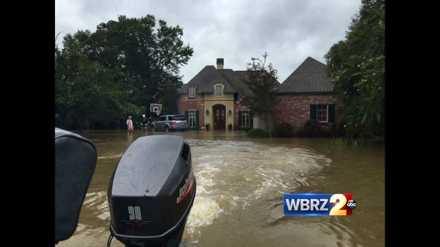In flood zone, many Louisiana families yearn to return home