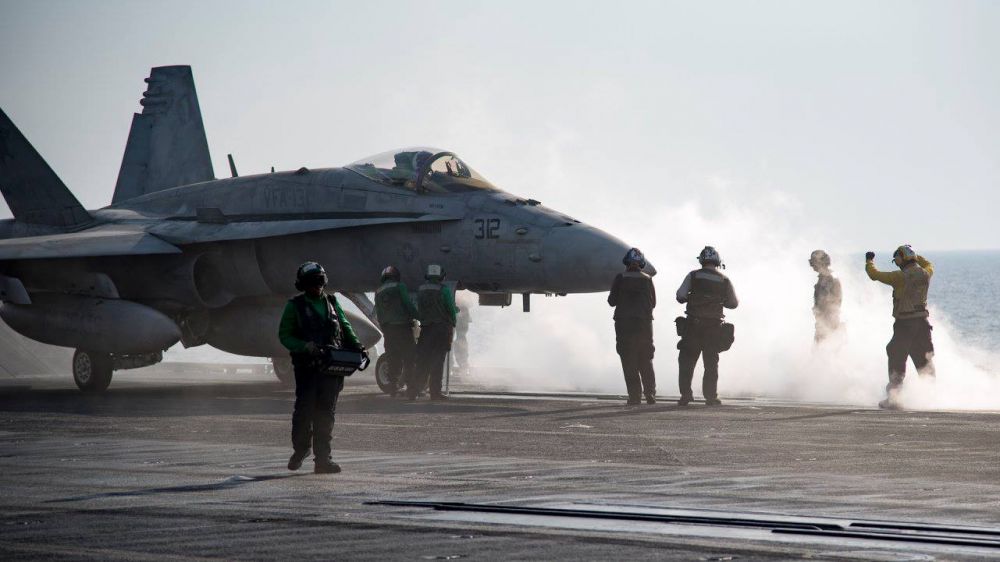 PHOTOS: US Navy serves up turkey alongside sorties on Thanksgiving