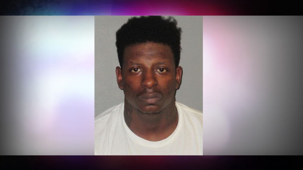 Man crawls through drive-thru window, beats woman