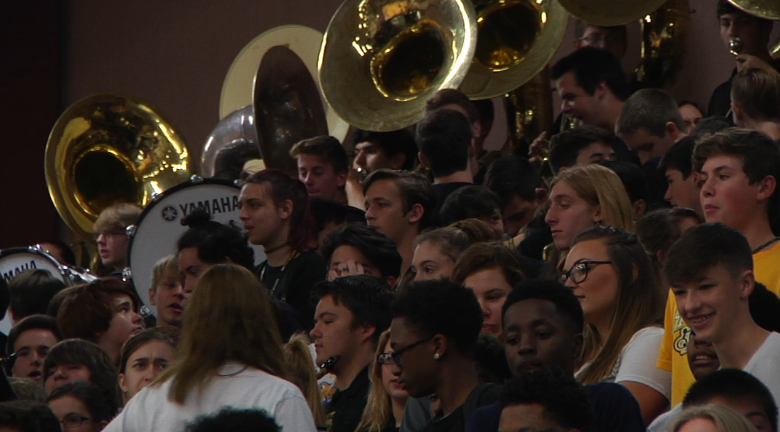 High school rivals sharing school site face off in football game