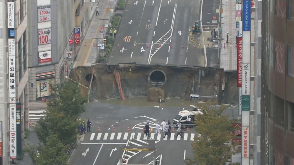 Parts of street collapse in southern Japan city; no injuries