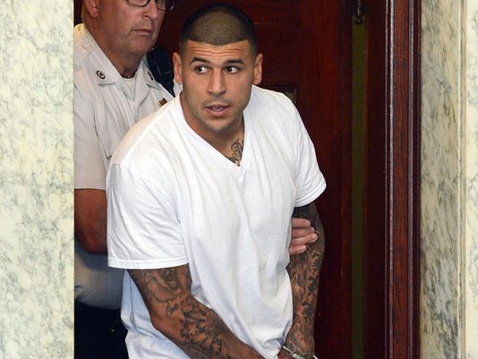 Ex-NFL star back in court ahead of double murder trial