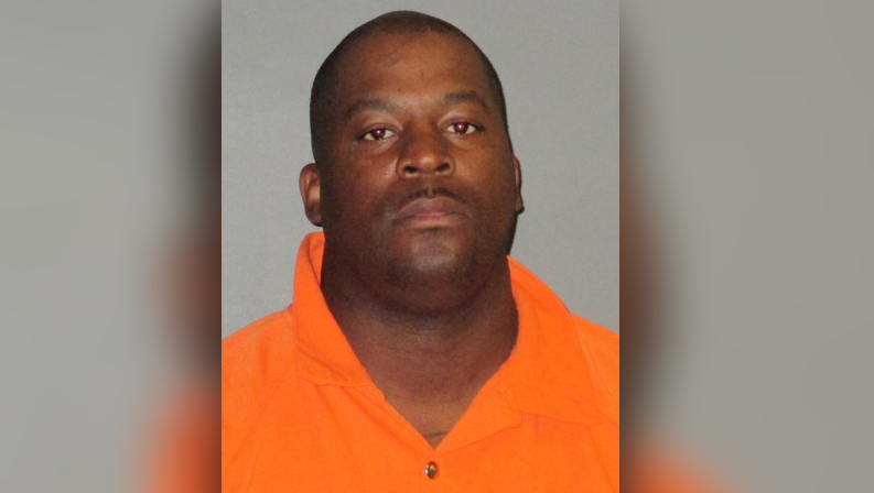 Man arrested for punching woman, son intervenes