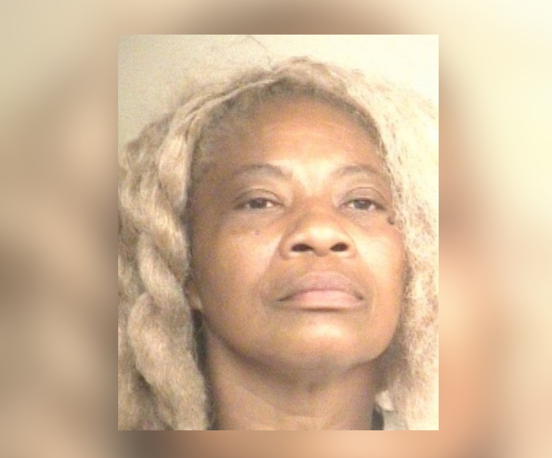 Woman charged with killing elderly father with boiling water